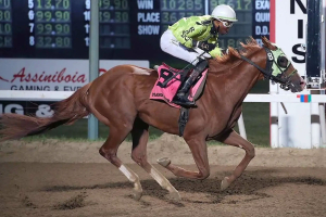 Antonio Whitehall on Mano Dura wins the Manitoba Derby at Assiniboia Downs on Monday, August 7, 2023.