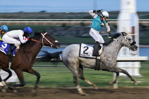 Uncharacteristic crossing the wire with jockey Alexander Marti at Century Mile on Sept. 11, 2021