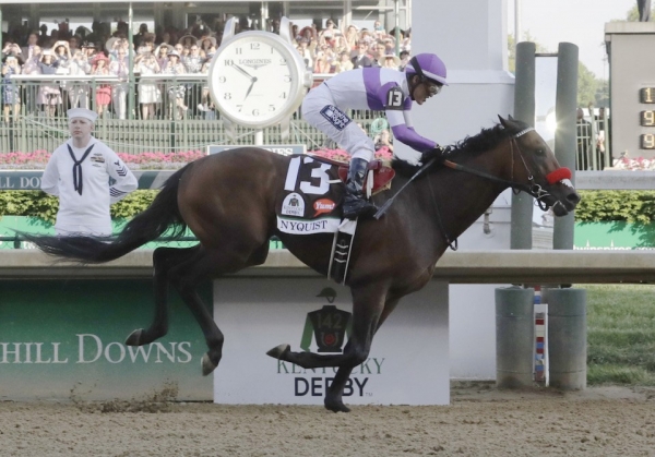 Mario Guitierrez rides Nyquist to victory during the 142nd running of the Kentucky Derby