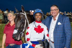 Winner circle smiles for the connections of Great Escape, winner of the 2022 Canadian Derby