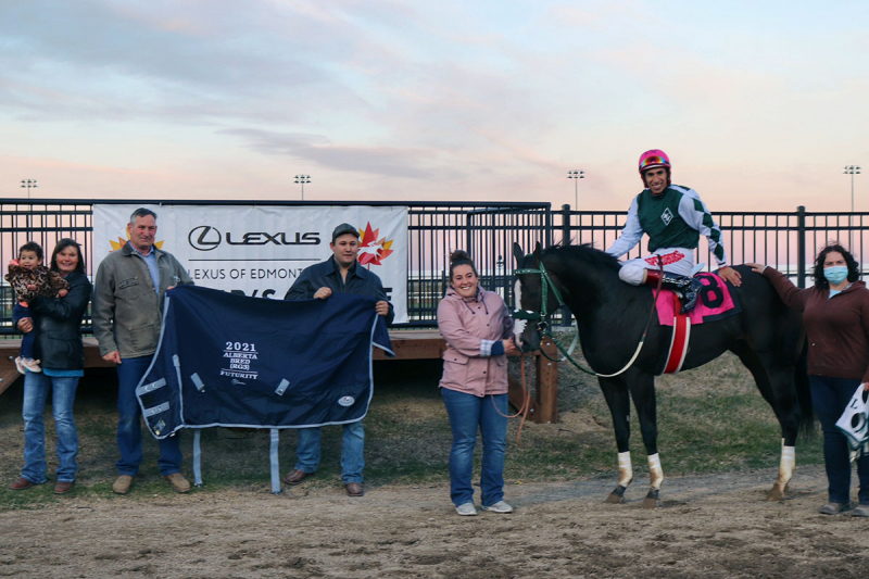 Destello De Luna in the winner&#039;s circle with the Leech family and Ricardo Moreno
